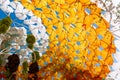 Background of orange and white umbrellas under a sunny sky