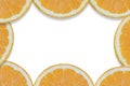 Background with oranges cut into pieces. Close-up texture. Copy space