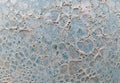 Background of pale blue surface of pottery showing bubble detail