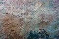 Colored texture of an old concrete wall with cracks