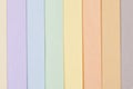 Background of pastel colors paper , parallel vertical stripes