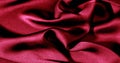 Background, pattern, texture, wallpaper, red silk fabric. Add a touch of luxury to any design by adding it to this ultra-soft and Royalty Free Stock Photo