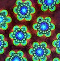 A background of patterned daisy shapes. Royalty Free Stock Photo