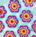 A background of patterned daisy shapes. Royalty Free Stock Photo