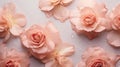 Background with peach-colored rose petals, flowers and water drops on a concrete background.