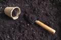 Background with peat pots and the ground. Spring planting work. Royalty Free Stock Photo