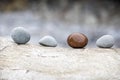 .A background of pebbles by the ocean on the beach, a symbol of peace and relaxation and diversity Royalty Free Stock Photo