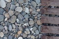 Background pebbles and wooden walkway