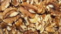 Background of peeled walnuts.Closeup of big shelled walnuts pile. Royalty Free Stock Photo