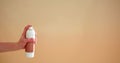 Background photo with a hand who is using a spray Royalty Free Stock Photo