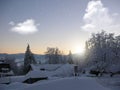 Background photo of low clouds in a mountain valley, vibrant blue and orange sky. Sunrise or sunset view of mountains and peaks Royalty Free Stock Photo