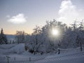 Background photo of low clouds in a mountain valley, vibrant blue and orange sky. Sunrise or sunset view of mountains and peaks Royalty Free Stock Photo