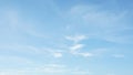 Background picture bright blue sky with thin white clouds