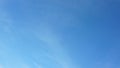 Background picture bright blue sky with thin white clouds