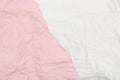 Background of a piece of crumpled paper pink and white Royalty Free Stock Photo