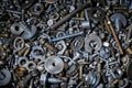 Abstract background with various screws, nuts, bolts and washers and other fasteners. Macro Royalty Free Stock Photo