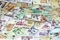 Background of a pile of Saudi Arabia riyals banknotes money bills of different values from different times