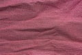 Texture wrinkled fabric dark pink color