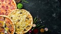 Background Pizza. Set of delicious pizzas with bacon, cheese and mushrooms. Royalty Free Stock Photo