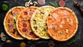 Background Pizza. Set of delicious pizzas with bacon, cheese and mushrooms.