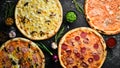 Background Pizza. Set of delicious pizzas with bacon, cheese and mushrooms. Royalty Free Stock Photo