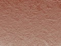 Background of plaster wall.Background in bright red colors.