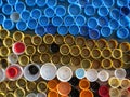 Background of plastic colorful bottle caps. Contamination with plastic waste. Environment and ecological balance. Art from junk. Royalty Free Stock Photo