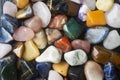 Background of polished colored gemstones