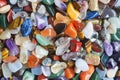 Background of polished colored gemstones