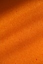 Background of porous foam rubber. Orange foam rubber. Packaging material Royalty Free Stock Photo