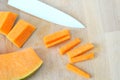 Background with pumpkin and ceramic knife, top view Royalty Free Stock Photo