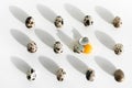 Background of quail eggs on white, one broken, with yellow yolk. Easter concept Royalty Free Stock Photo