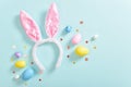 Background with rabbit ears and Easter eggs. The concept of finding eggs for Easter. Happy Easter celebration. Space for Royalty Free Stock Photo