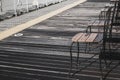 The background of railway platform for comfortable waiting seat for a coming train in a Japaneses train station Royalty Free Stock Photo