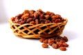 Small basket of dried grape brown raisins