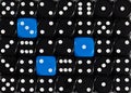 Background of random ordered black dices with three blue cubes Royalty Free Stock Photo