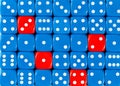 Background of random ordered blue dices with four red cubes Royalty Free Stock Photo