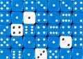 Background of random ordered blue dices with four white cubes