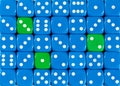 Background of random ordered blue dices with three green cubes Royalty Free Stock Photo