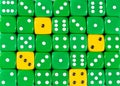 Background of random ordered green dices with four yellow cubes Royalty Free Stock Photo