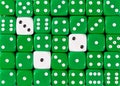 Background of random ordered green dices with three white cubes Royalty Free Stock Photo