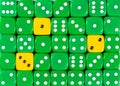 Background of random ordered green dices with three yellow cubes Royalty Free Stock Photo