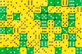Background of 140 random ordered green and yellow dices Royalty Free Stock Photo