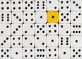 Background of random ordered white dices with one yellow cube Royalty Free Stock Photo