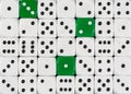 Background of random ordered white dices with three green cubes Royalty Free Stock Photo