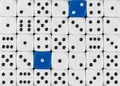 Background of random ordered white dices with two blue cubes