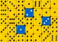 Background of random ordered yellow dices with three blue cubes Royalty Free Stock Photo