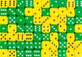 Background of 70 random ordered yellow and green dices Royalty Free Stock Photo