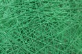 Background of randomly arranged fibers green.