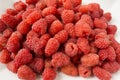 Background of raspberries. Fresh raspberries closeup on white background. Top view. Background of red berries. Various fresh summe Royalty Free Stock Photo